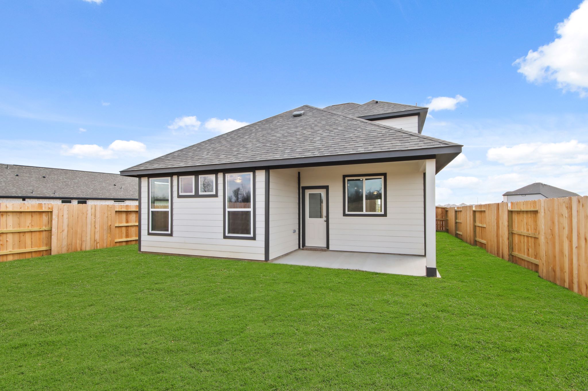 A house with a fence around it.