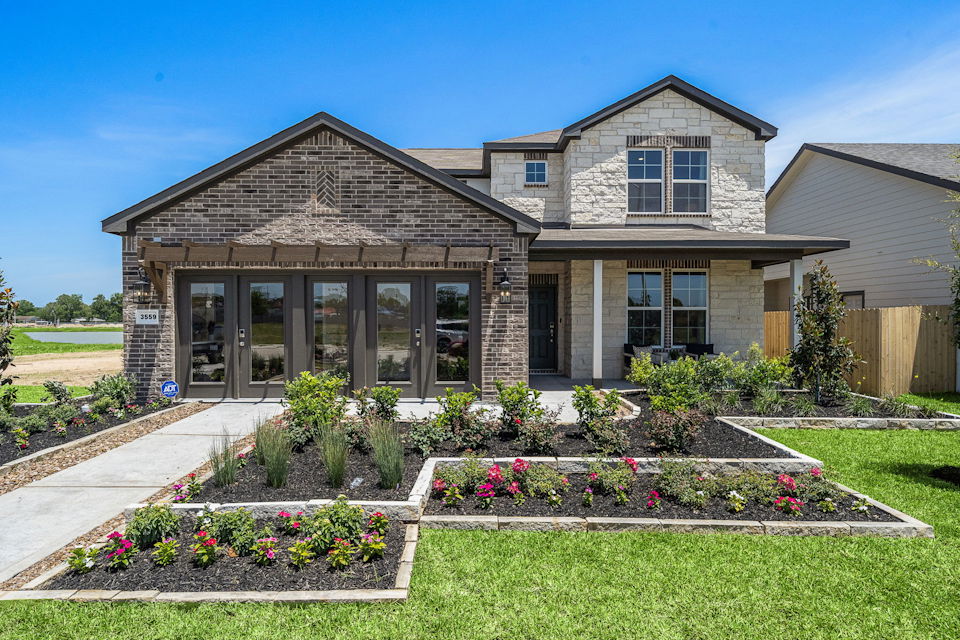 A house with a large front yard.