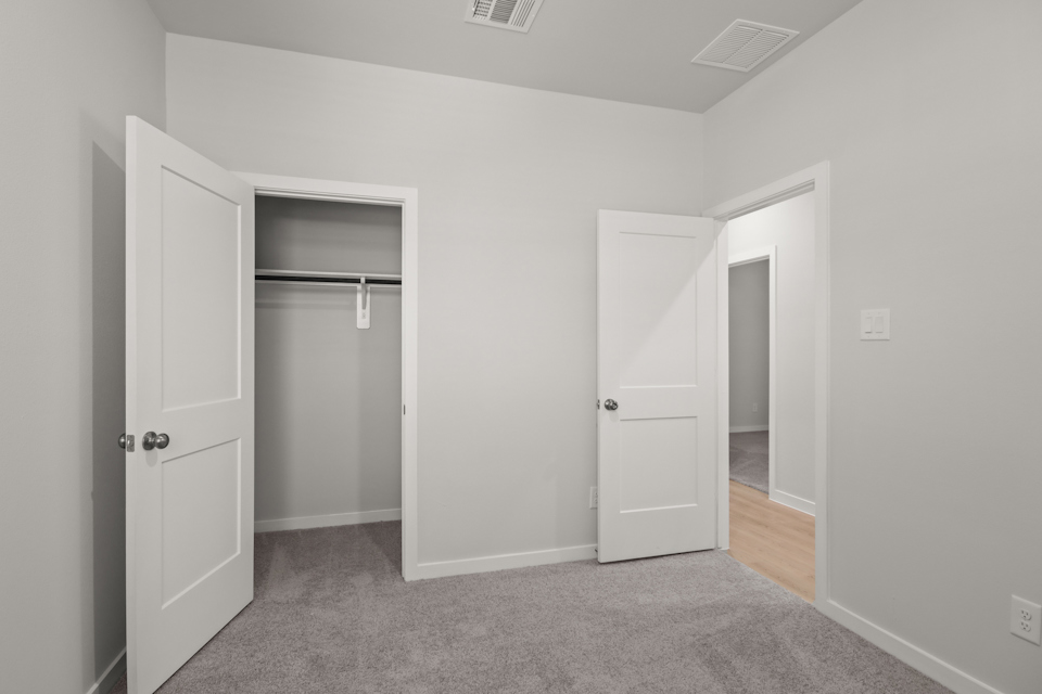 A room with white doors.