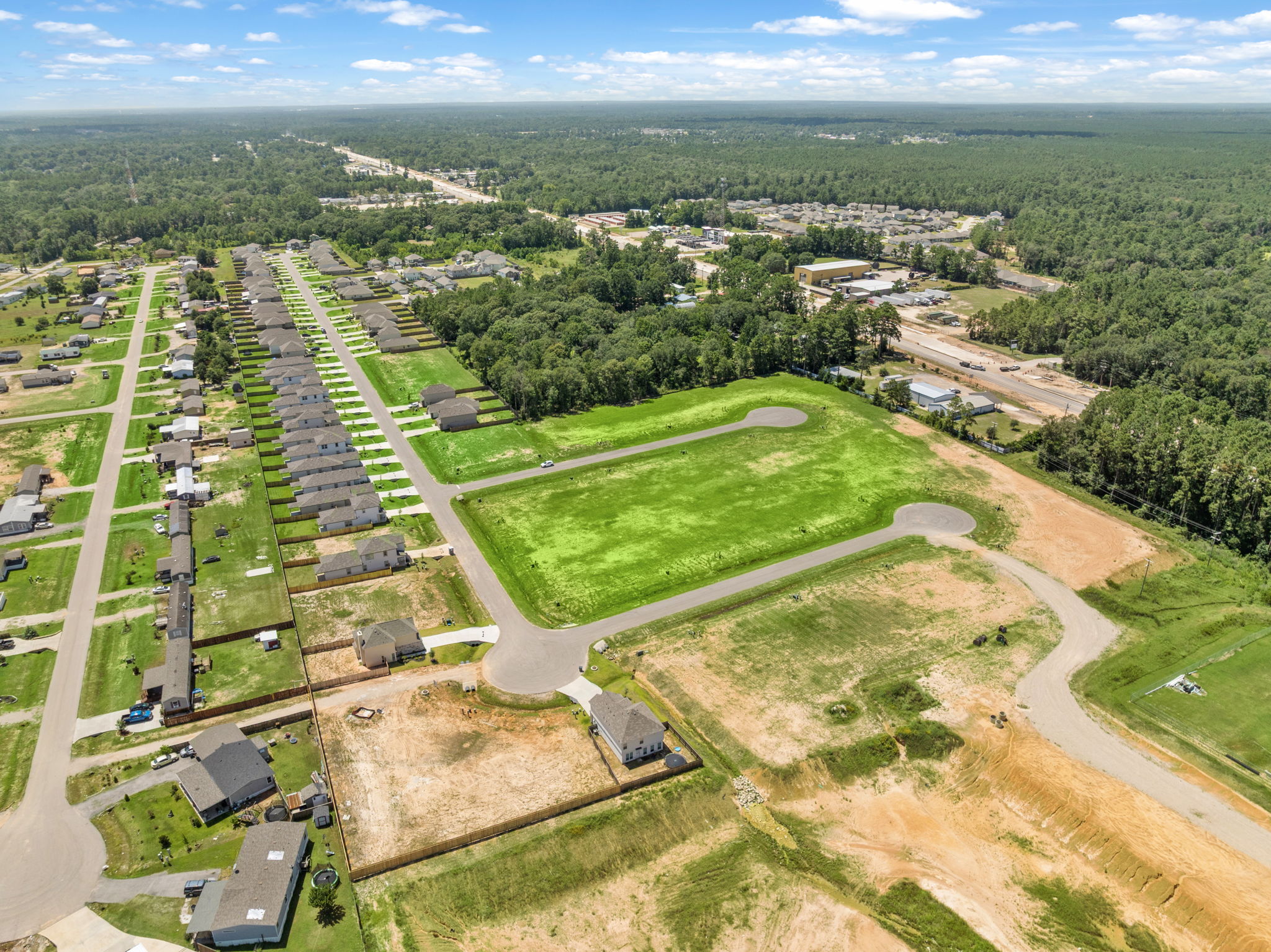 A landscape with a river and trees.