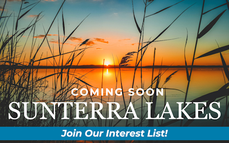 A sunset behind a fence.