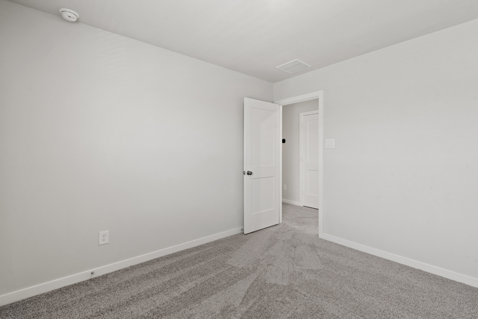 A room with white doors.