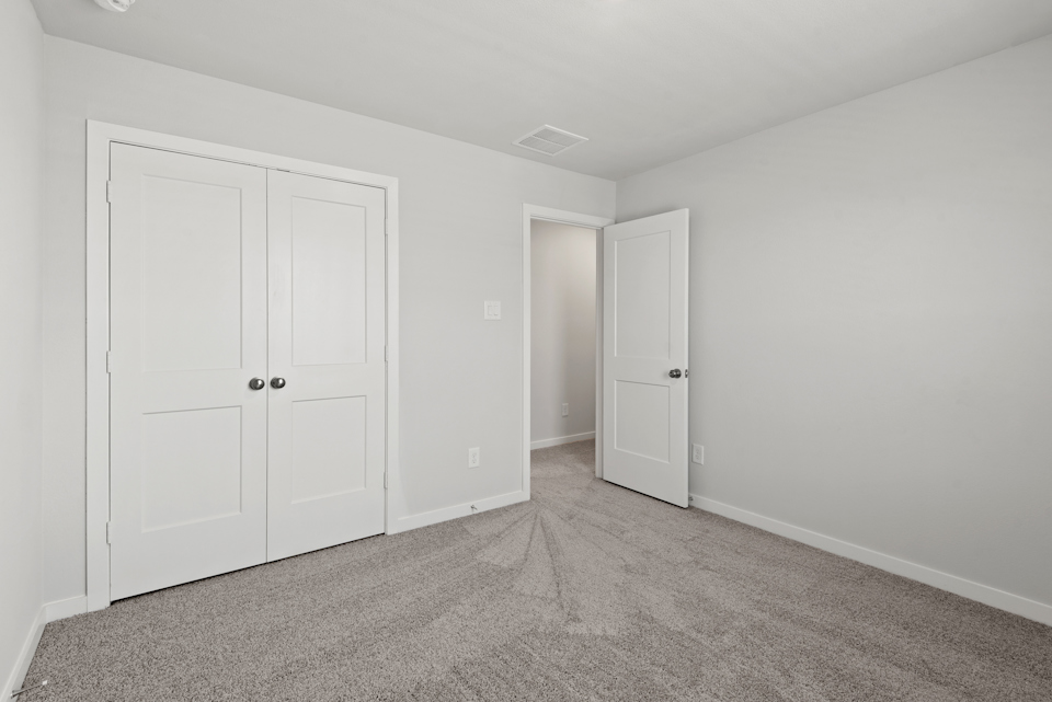 A room with white doors.