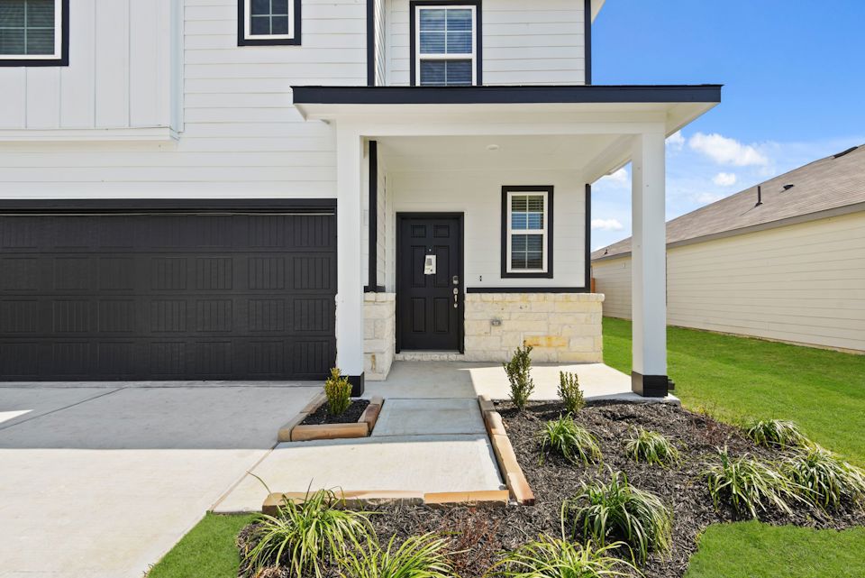 A house with a front yard.