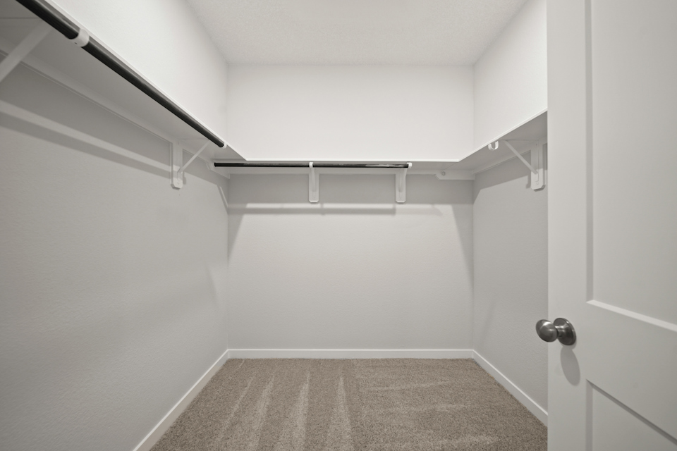 A white hallway with white walls.