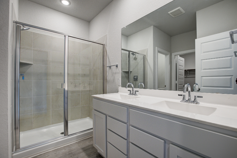 A bathroom with a glass shower.