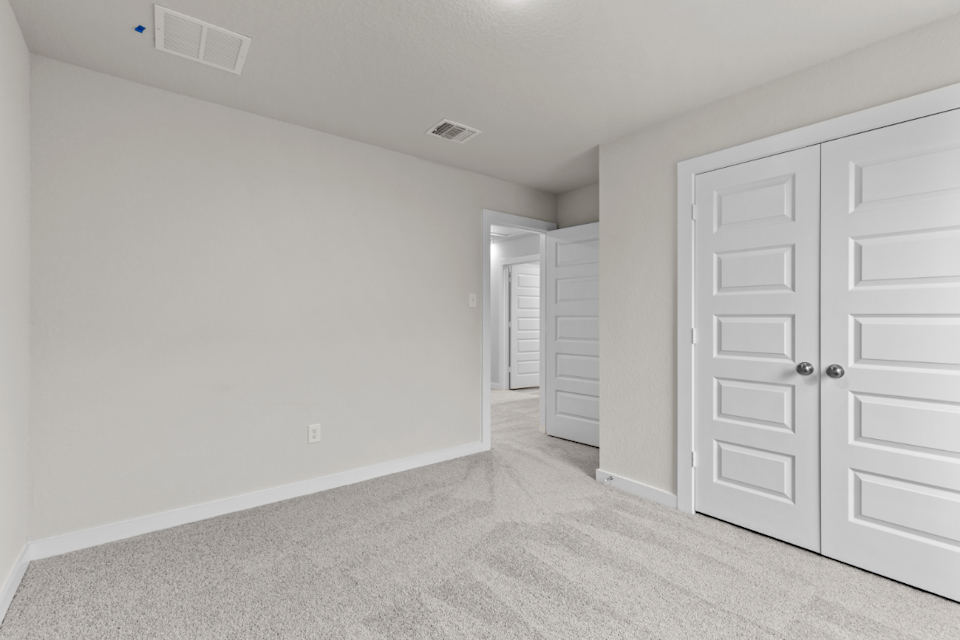 A room with white doors.