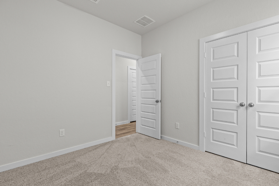 A room with white doors.