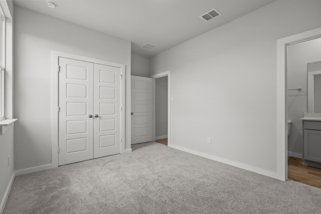A room with white doors.