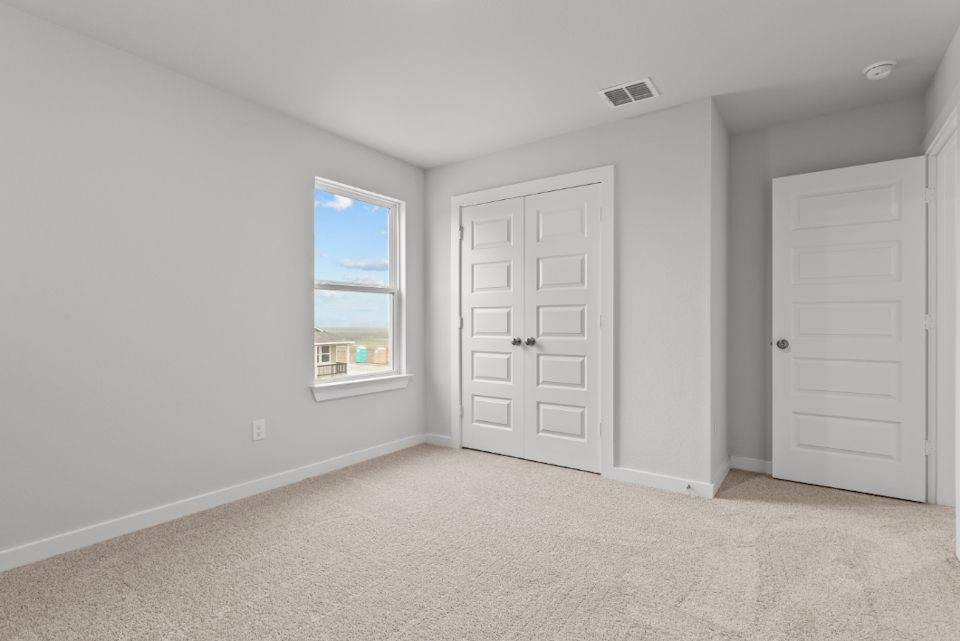 A room with white doors.