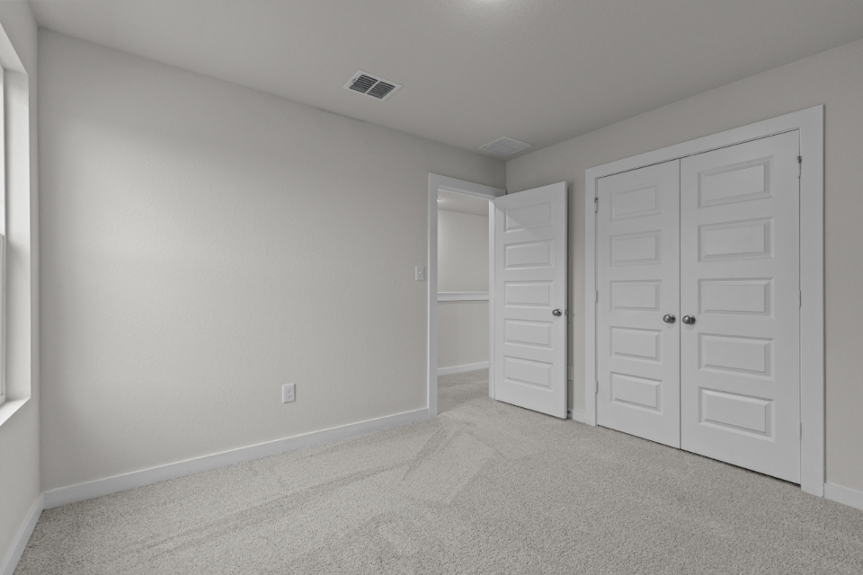 A room with white doors.