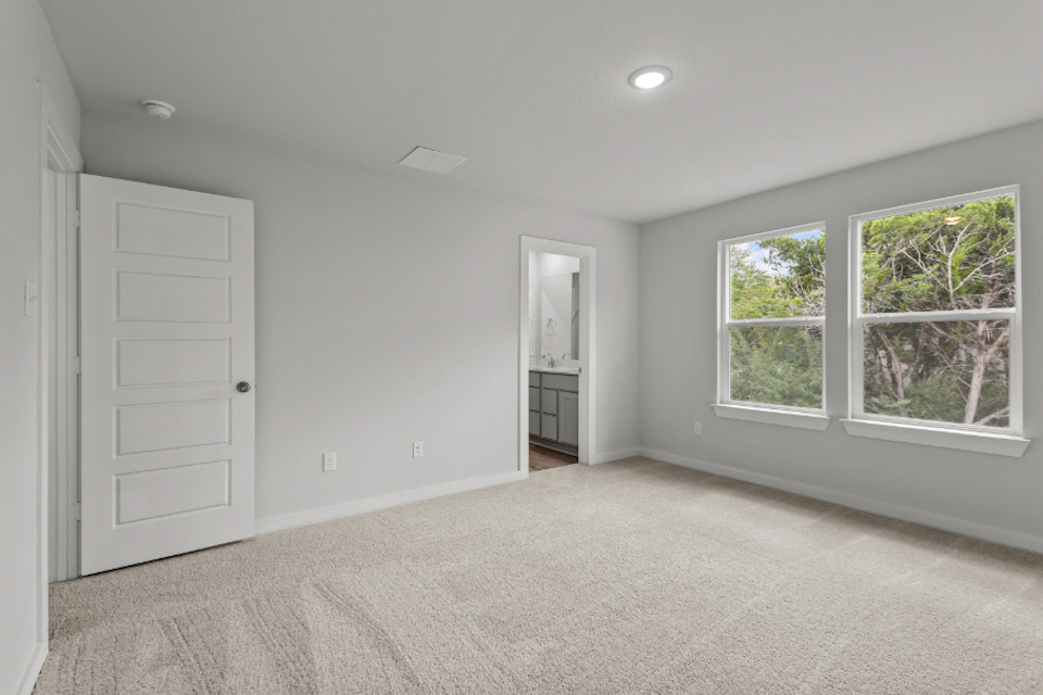 A living room with white walls.