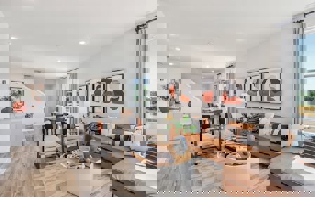 A living room with a large window.