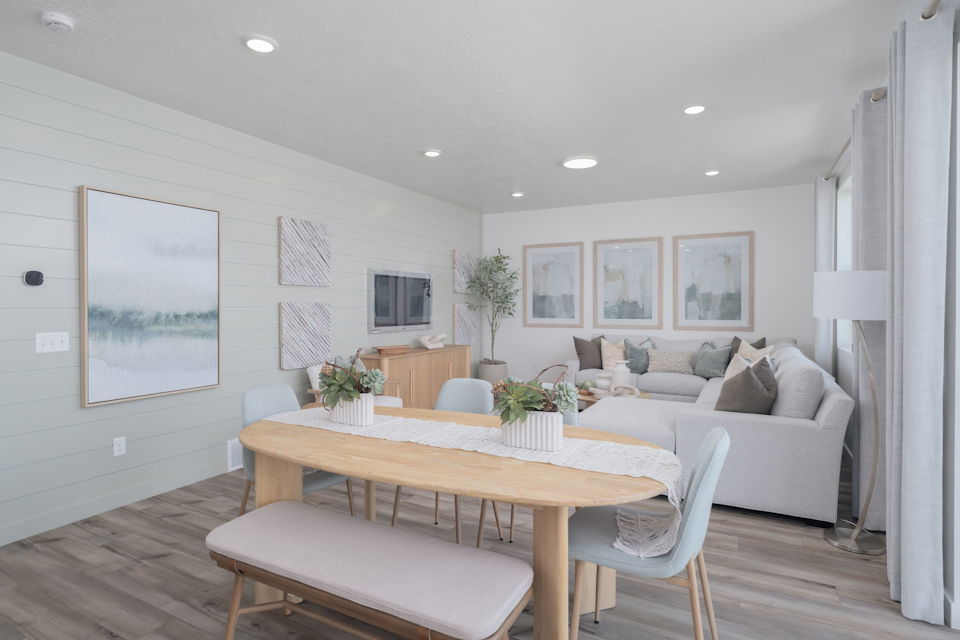 A living room with a couch and a table.
