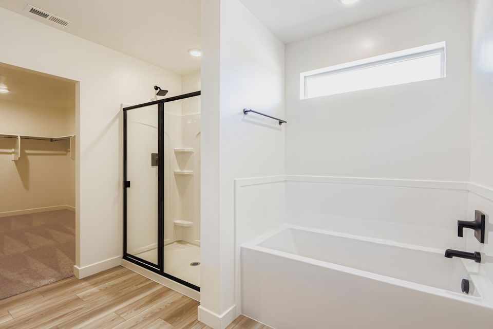 A bathroom with a glass shower.