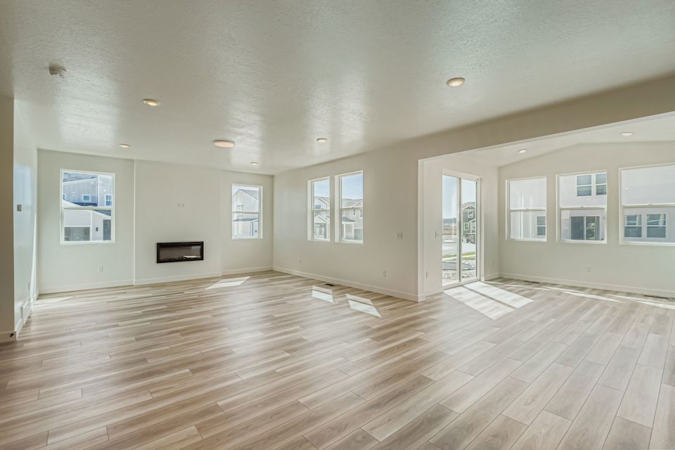 A large empty room with white walls.