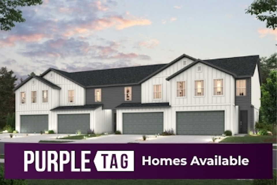 A large house with garages.