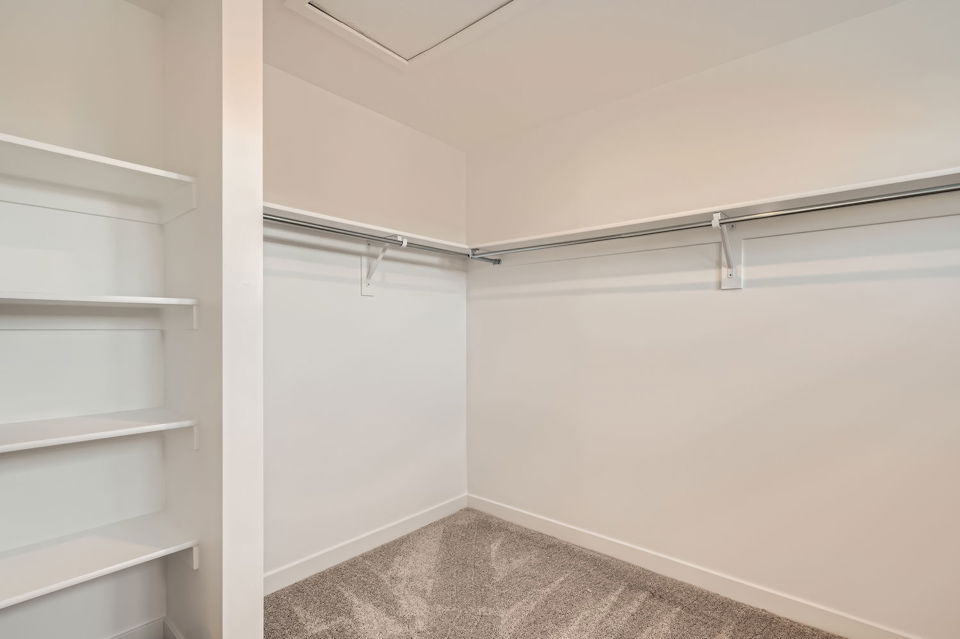 A white room with a white wall.