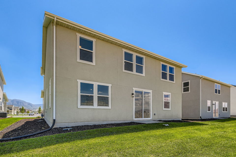 A building with a lawn in front of it.