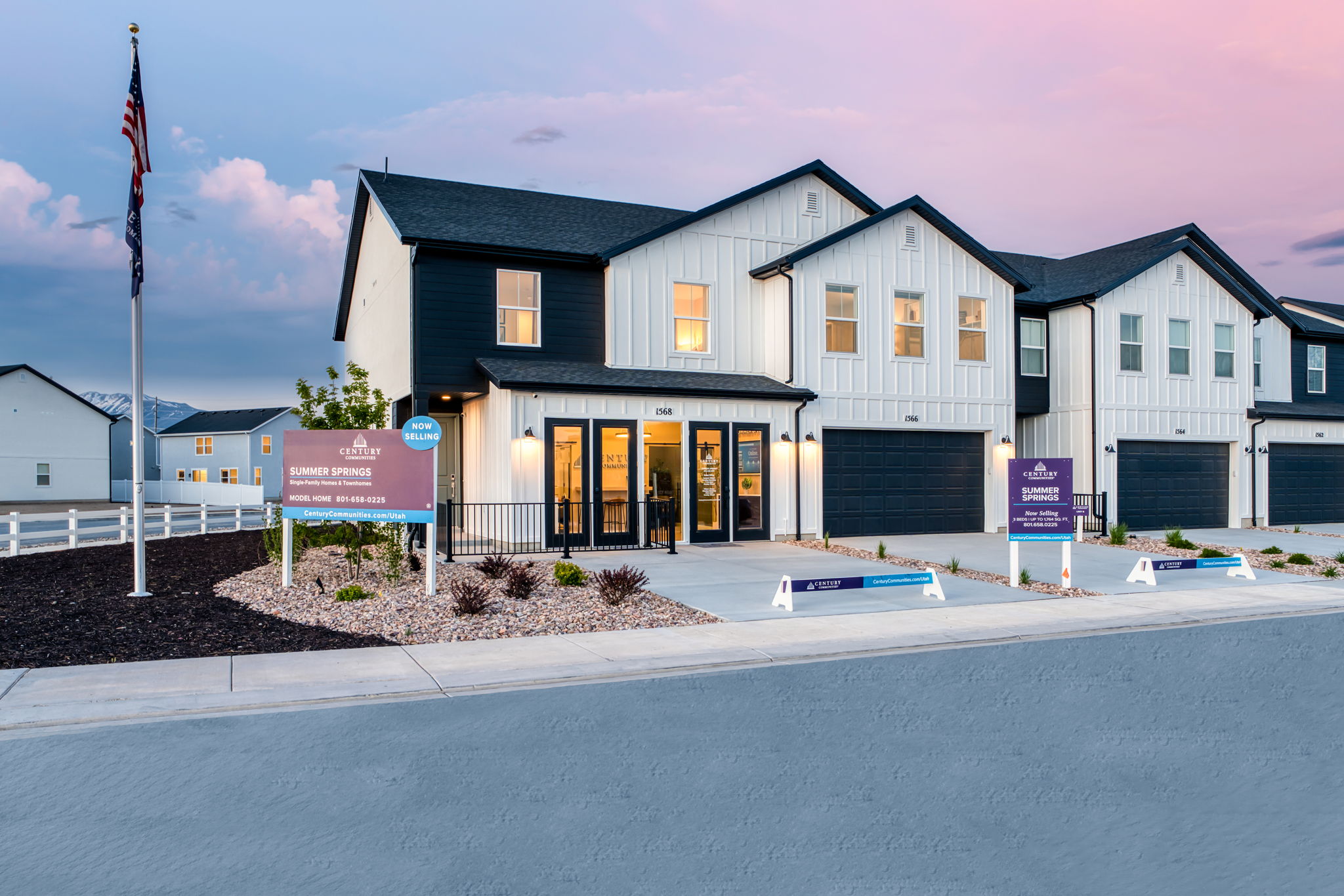 A building with a sign in front.