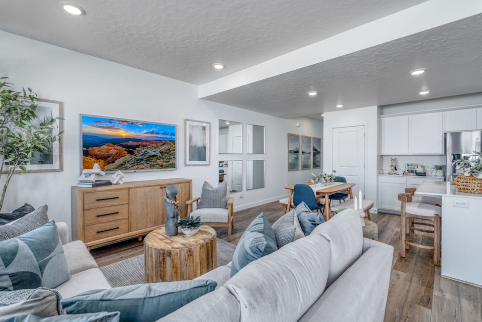 A living room with a couch and a table.