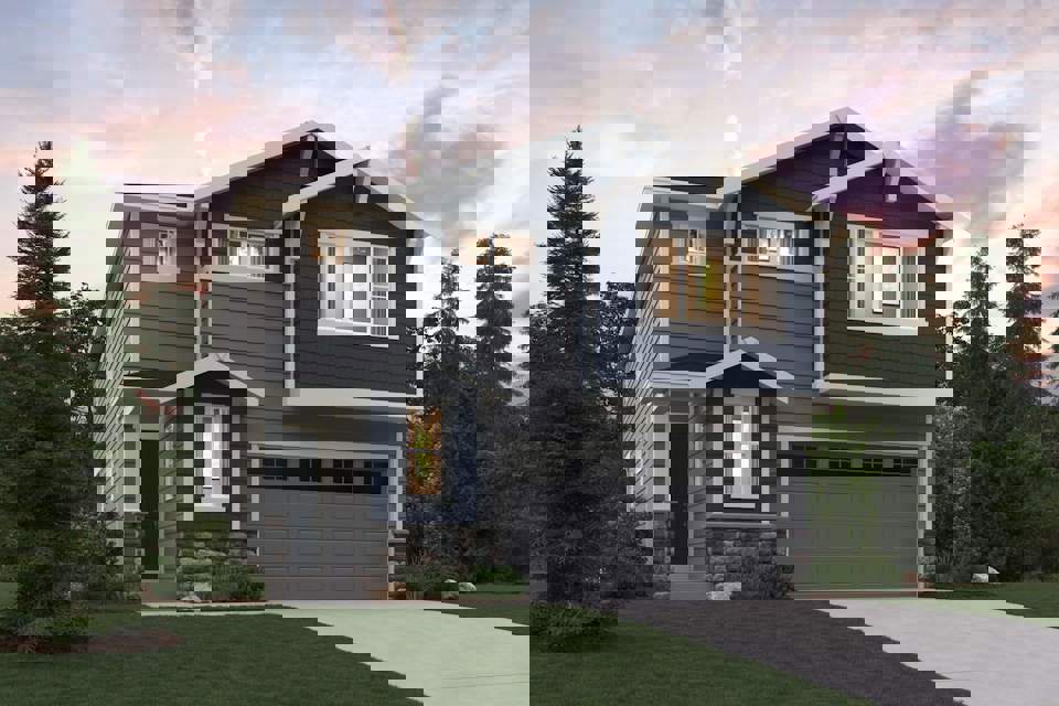 A house with a garage with Graceland in the background.