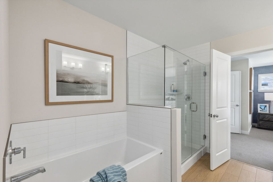 A bathroom with a glass shower.