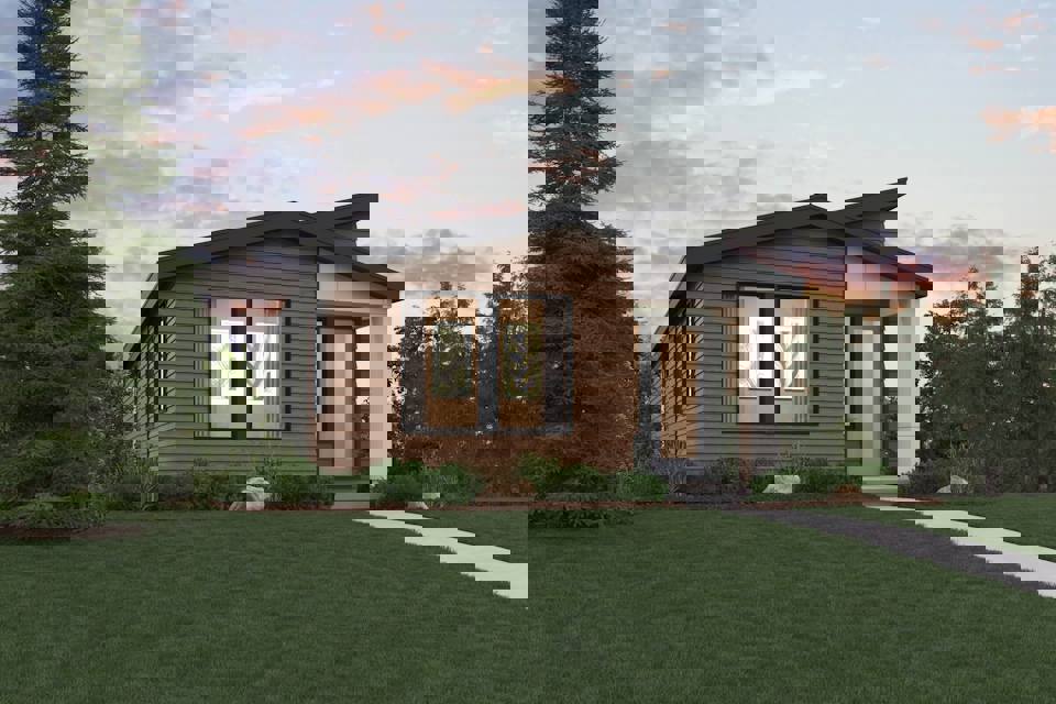 A house with a grass yard.