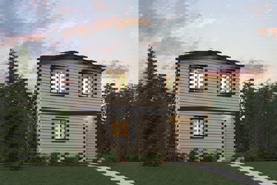 A house with trees in the back.