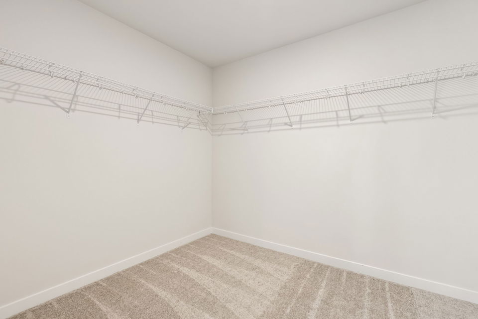 A white room with a tile floor.