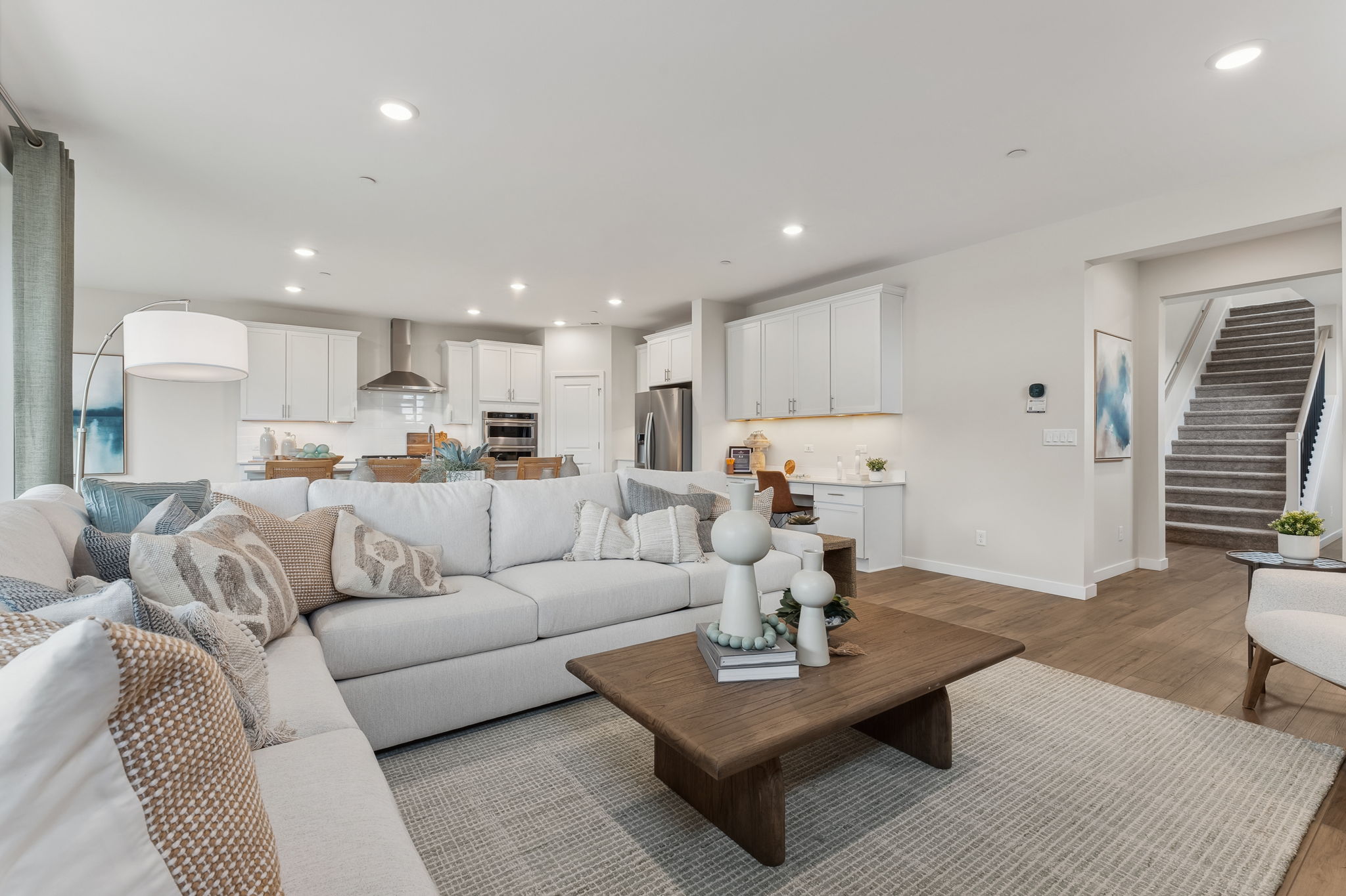 A living room with a couch and a coffee table.