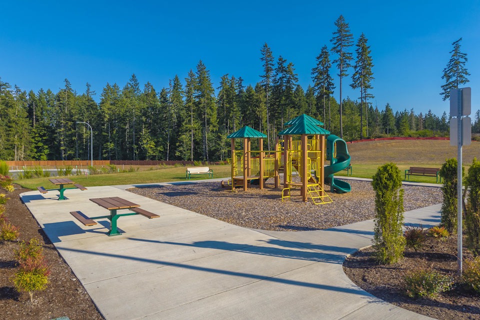 A small play structure in a park.