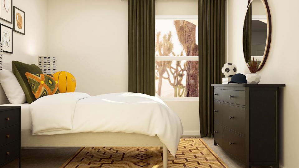 A bedroom with a bed and a dresser.