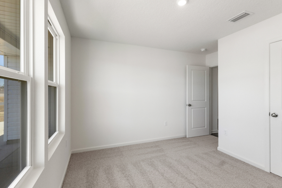 A room with white doors.