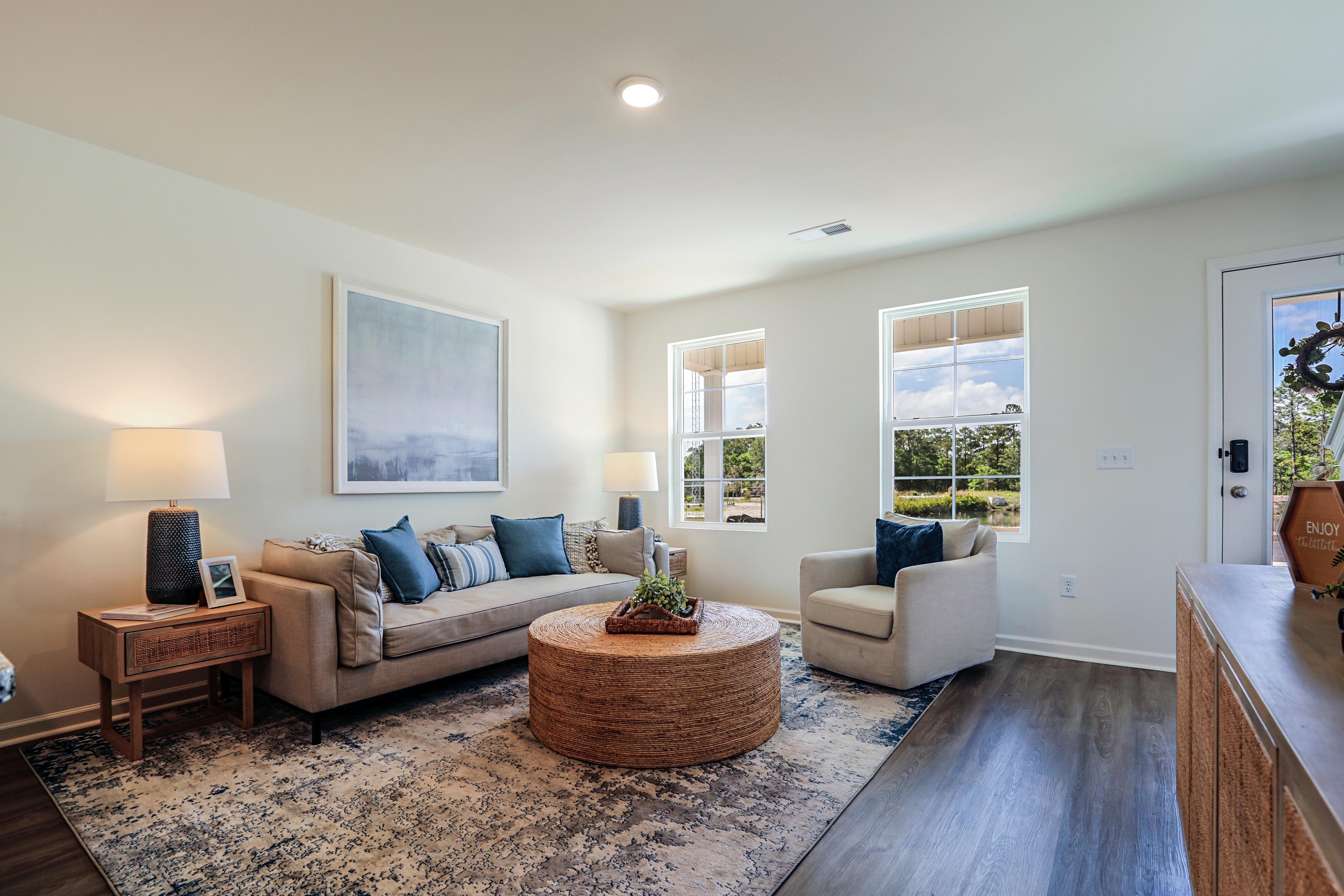 A living room with a couch and a coffee table.