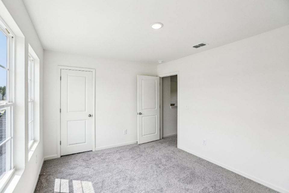 A room with white doors.