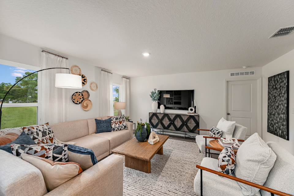 A living room with a fireplace.