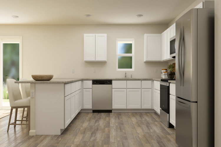 A kitchen with white cabinets.