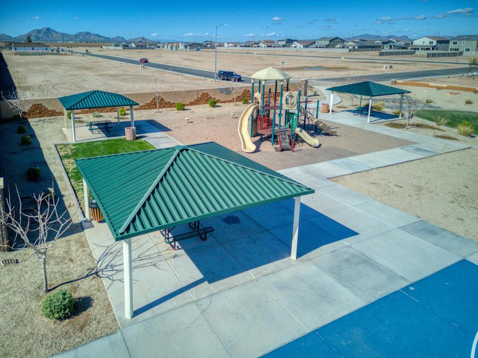 A swimming pool with a slide.