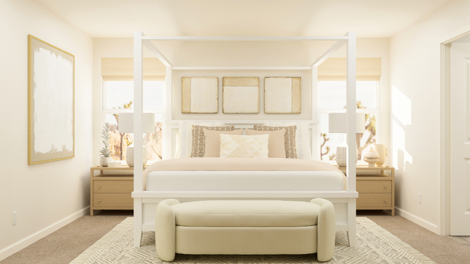 A white bed in a room.