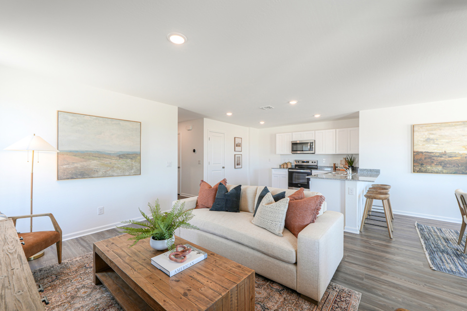 A living room with a couch and a coffee table.
