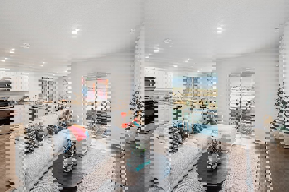 A living room with a large window.