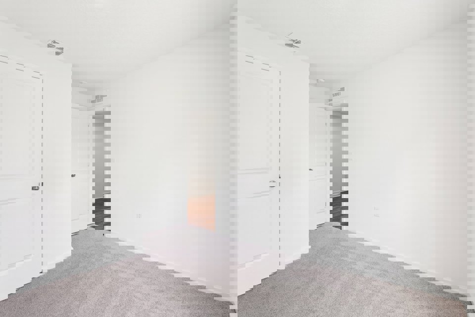 A room with white doors.