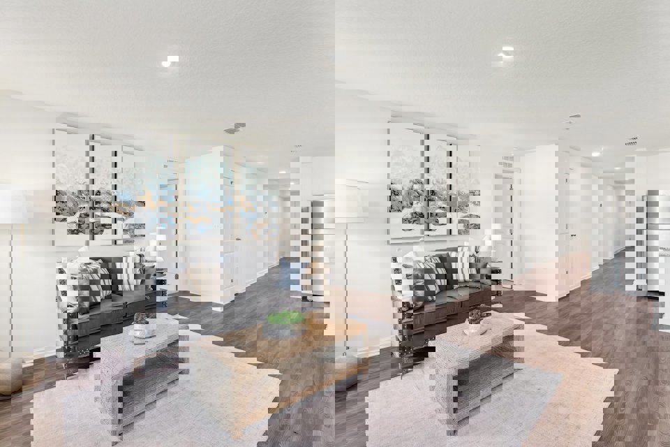 A living room with a couch and a coffee table.