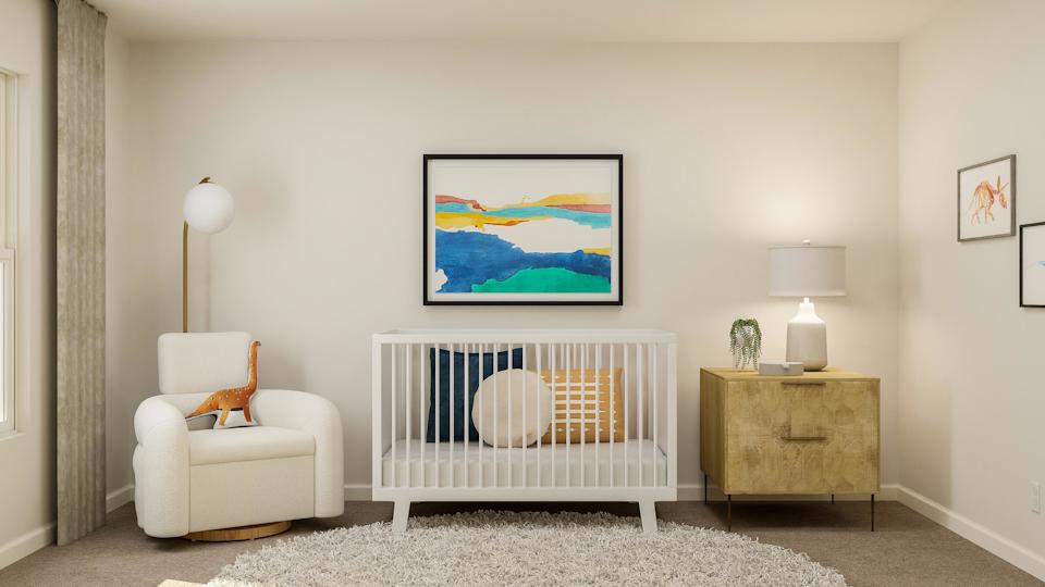 A room with a white chair and a white radiator.