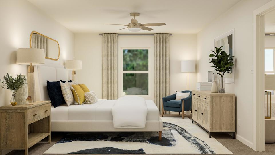 A living room with a couch and a table.