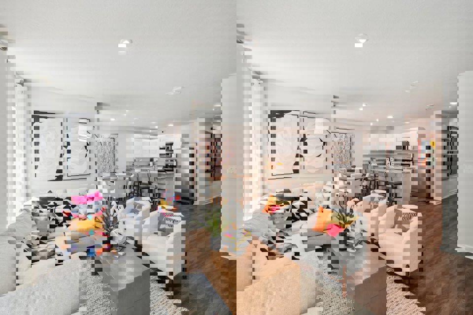 A living room with a large dining area.