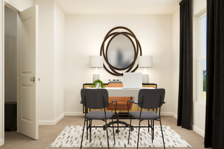 A dining room table with chairs.
