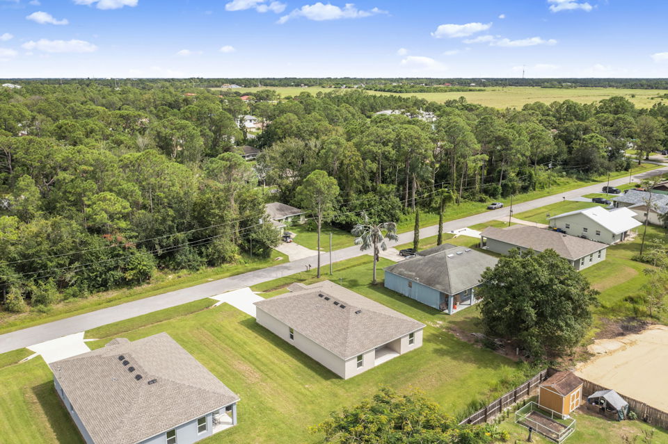 A group of buildings and trees.