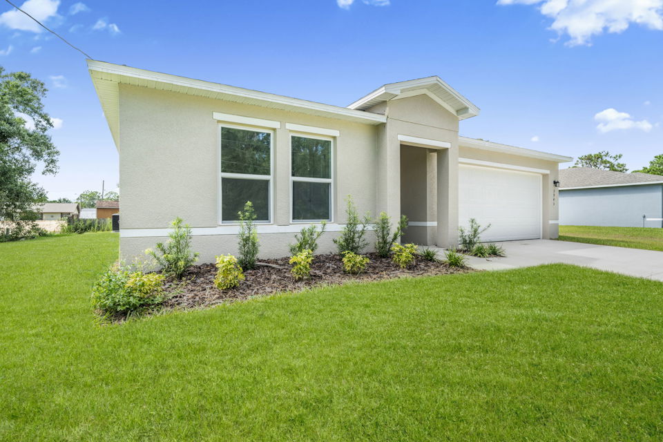 A house with a lawn.